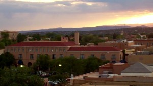 Santa Fe sunset over Saint Francis Hotel. Picture taken from the top of La Fonda Hotel.